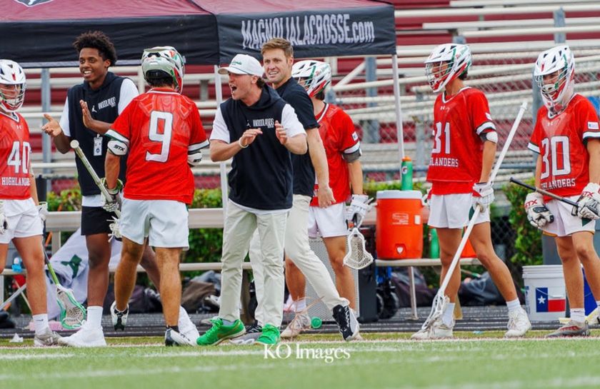 Coach Anthony DeMaio celebrating with The Woodlands lacrosse players